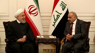 روحاني (يسار) بصحبة رئيس الوزراء العراقي عادل عبد المهدي