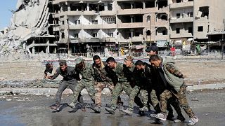 Raqqa, 18.10.2017. Militari dell'esercito siriano a Raqqa.