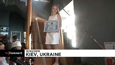 Ukrainian "Rapunzel" breaks a record for her long blonde hair