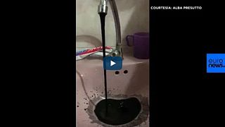 Why did the tap water in this Venezuela municipality turn black?