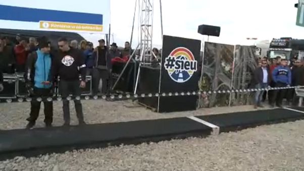 Romanian protest leader builds a one metre "motorway" Romanian protest leader builds a one metre "motorway"