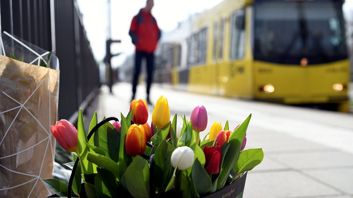 Flowers are placed at the site of a shooting in Utrecht, the Netherlands