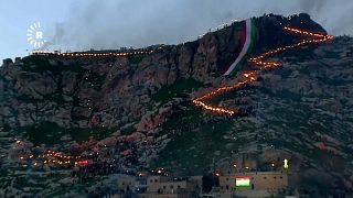 Thousands climbed the Akre mountain in a torchlit procession