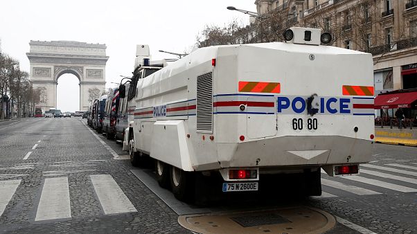 French police water canon vehicle is in place on the Champs-Elysees French police water canon vehicle is in place on the Champs-Elysees