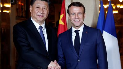 الرئيس الصيني ونظيره الفرنسي ماكرون