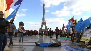 demonstrators gathered on Place du Trocadero square near the Eiffel Tower