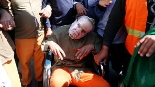 Manifestant avec un masque représentant Abdelaziz Bouteflika, le 29/03/2019
