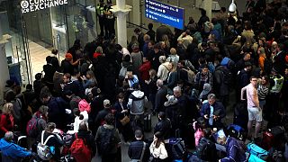 People wait due to Eurostar delaysat St Pancras.  