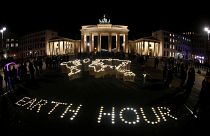World landmarks switch the lights off to mark Earth Hour