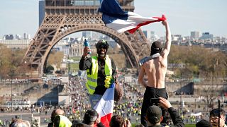 Protesters wearing yellow vests attend a demonstration during the Act XX 