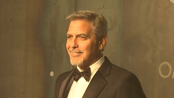 George Clooney e Elton John apelam ao boicote a hotéis do Brunei George Clooney e Elton John apelam ao boicote a hotéis do Brunei