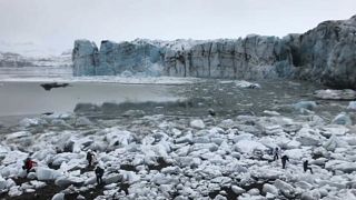 Watch: Tourists flee large wave after Icelandic glacier collapse