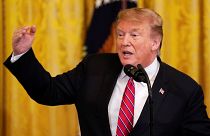 Trump visits the border and warns: 'Our country is full...turn around'