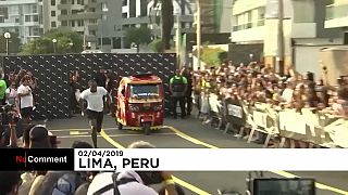 Bolt races against a motorcycle taxi and wins