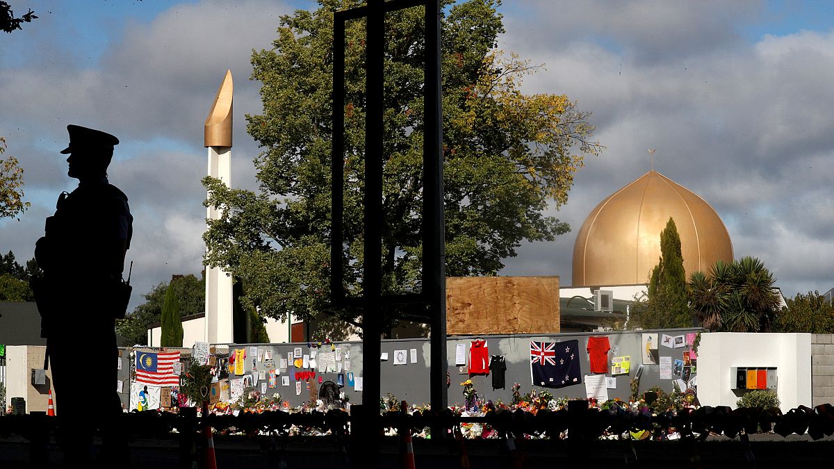 A police officer stands guard outside Al Noor mosque in Christchurch