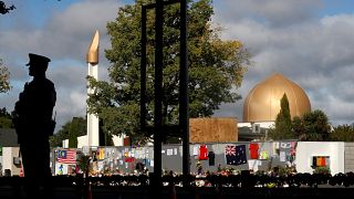 A police officer stands guard outside Al Noor mosque in Christchurch