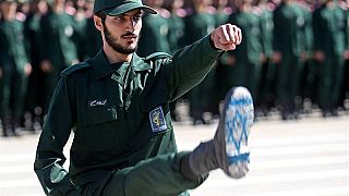 An Iranian IRGC officer with Israel's flag drawn on his boots, June 2018.