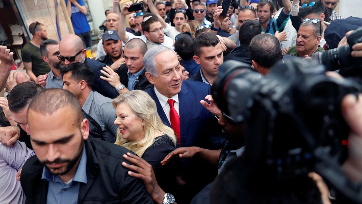 Benjamin Netanyahu and his wife on the campaign trail.