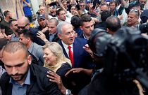 Benjamin Netanyahu and his wife on the campaign trail.