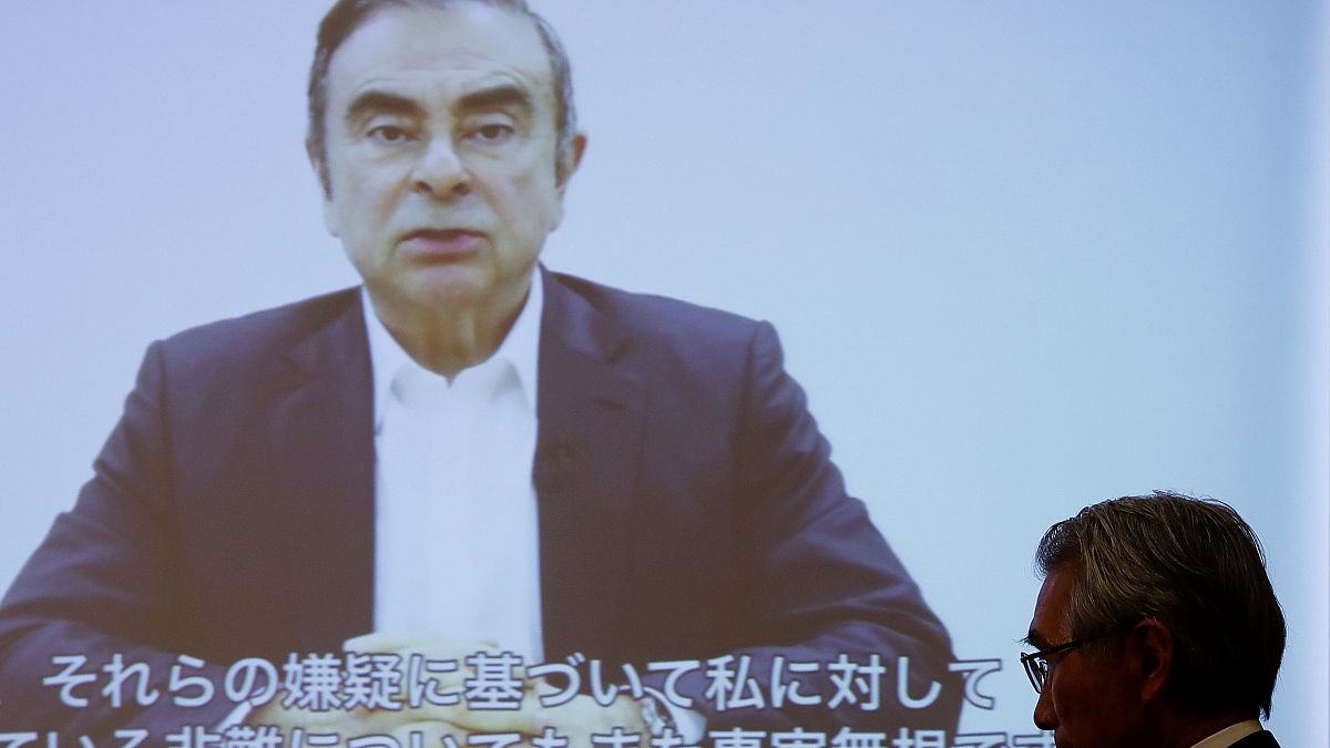 Nissan's former chair Ghosn says he was victim of 'backstabbing' in video address