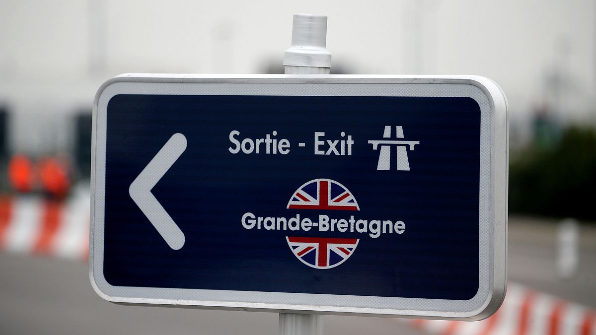A road exit sign at the pit stop zone at Eurotunnel terminal in Coquelles.