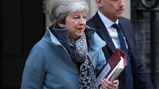 Britain's PM Theresa May leaves Downing Street on April 10, 2019.