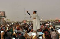 Female protester in Khartoum, 8 April 2019