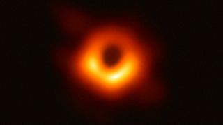 THE FIRST IMAGE OF A BLACK HOLE