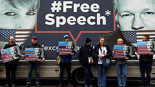 Assange 's supporters in front the Ecuador embassy of London.