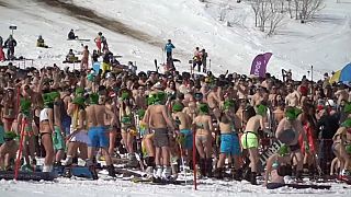 Swimwear-clad skiers defy the cold in Siberia to mark end of winter