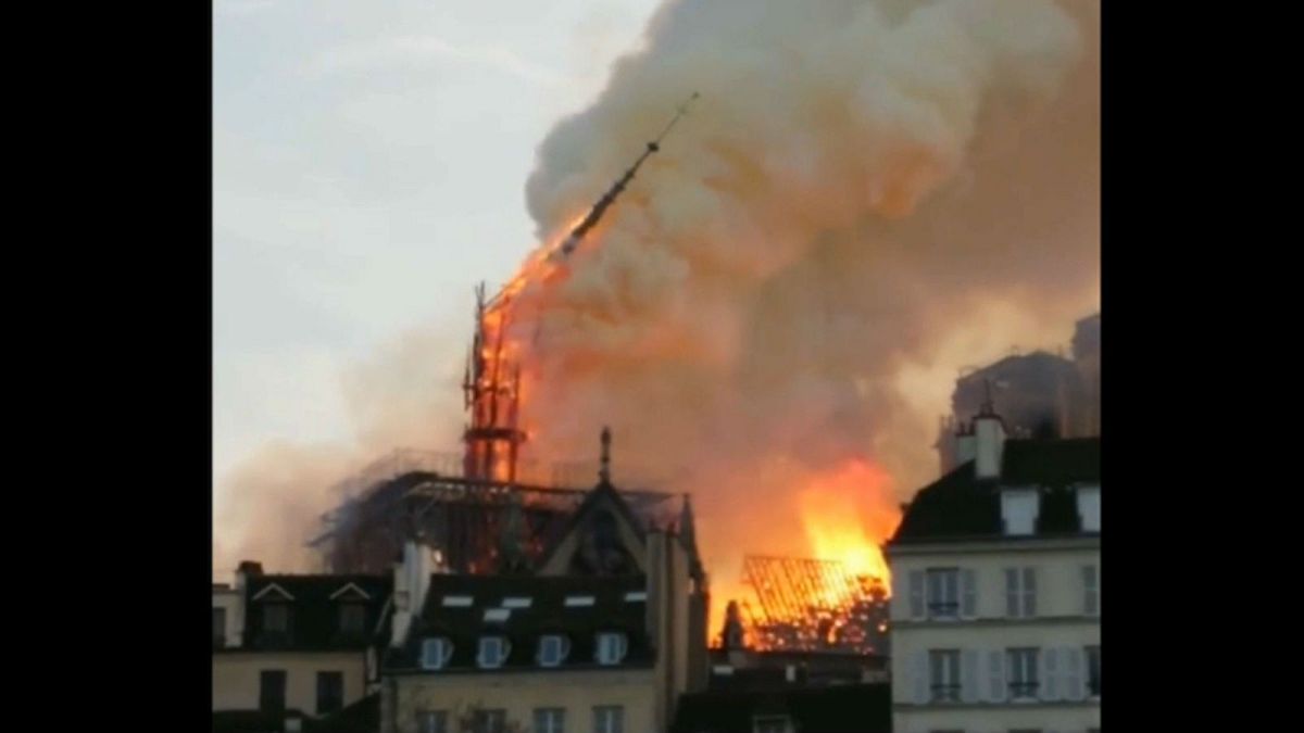 Watch: Moment Notre Dame Cathedral's spire comes crashing down amid fire