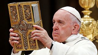 Pope Francis leads the Easter vigil Mass in Saint Peter's Basilica