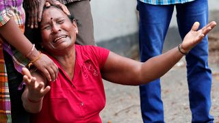 A relative of a victim of the explosion at St. Anthony's Shrine