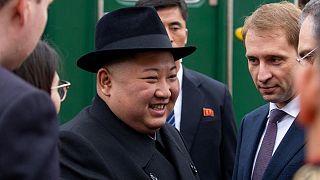 Kim Jong Un greeted with bread and flowers as he arrives in Russia for Putin meeting