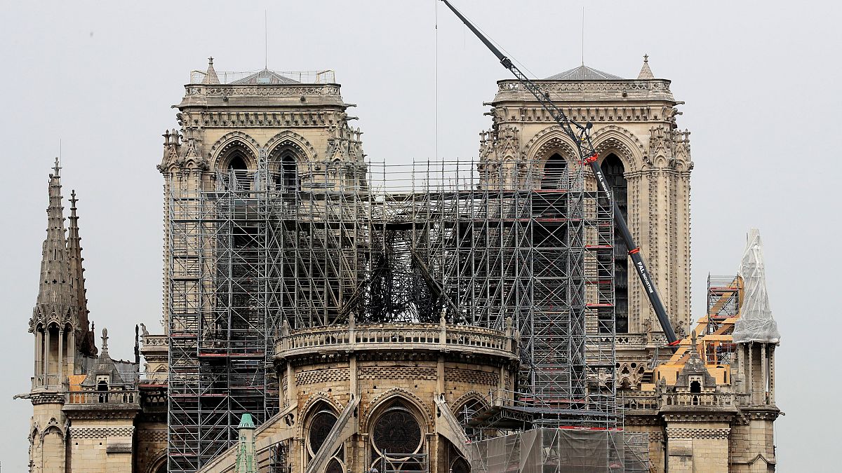Roof renovation company says workers smoked on top of Notre Dame but rules out that as cause