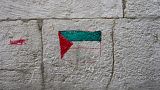 علم فلسطين بالغرافيتي على جدار في القدس