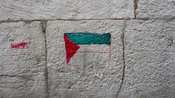 علم فلسطين بالغرافيتي على جدار في القدس