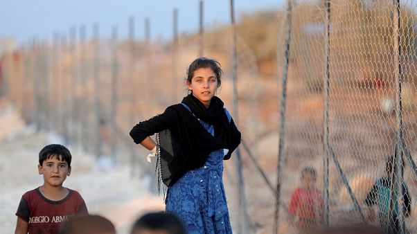 Almanya'da Suriyelilere yönelik ırkçı afişler: "IŞİD'in son kalesi de düştü, evinize dönün!" Almanya'da Suriyelilere yönelik ırkçı afişler: "IŞİD'in son kalesi de düştü, evinize dönün!"