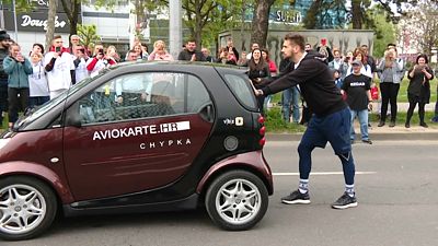 Young Croat breaks world record by pushing 730kg Smart car 100km