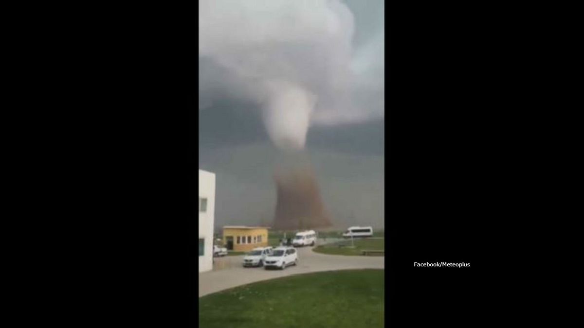 Watch: Powerful tornado touches down in Romanian countryside leaving wreckage behind
