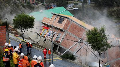 Bolivia: residents watch as landslide sweeps away houses