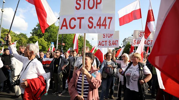 Polish far-right demonstrators protest against restitution of Jewish property Polish far-right demonstrators protest against restitution of Jewish property