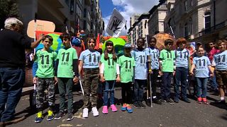 Children lead climate change marches across Europe