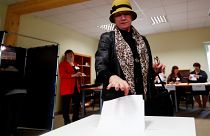 A woman casts her vote in Vilnius, Lithuania on May 12, 2019.