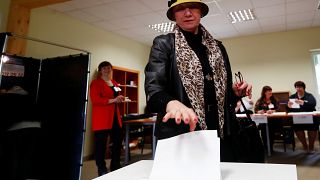 A woman casts her vote in Vilnius, Lithuania on May 12, 2019.