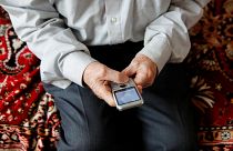 A man with a mobile phone