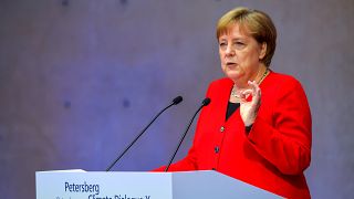 Angela Merkel addresses the 10th Petersburg Climate Dialogue