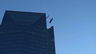 2 rescued from scaffold near top of Oklahoma tower