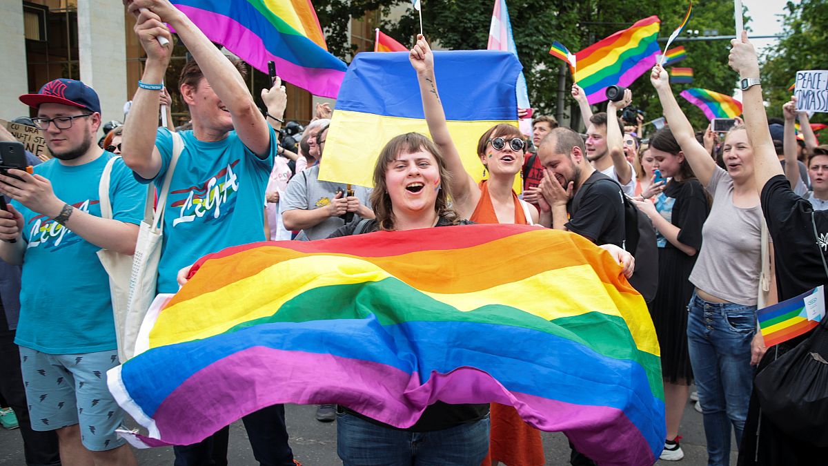 LGBT activists cheer at a solidarity march in Chisinau, Moldova