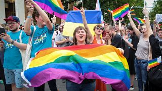 LGBT activists cheer at a solidarity march in Chisinau, Moldova